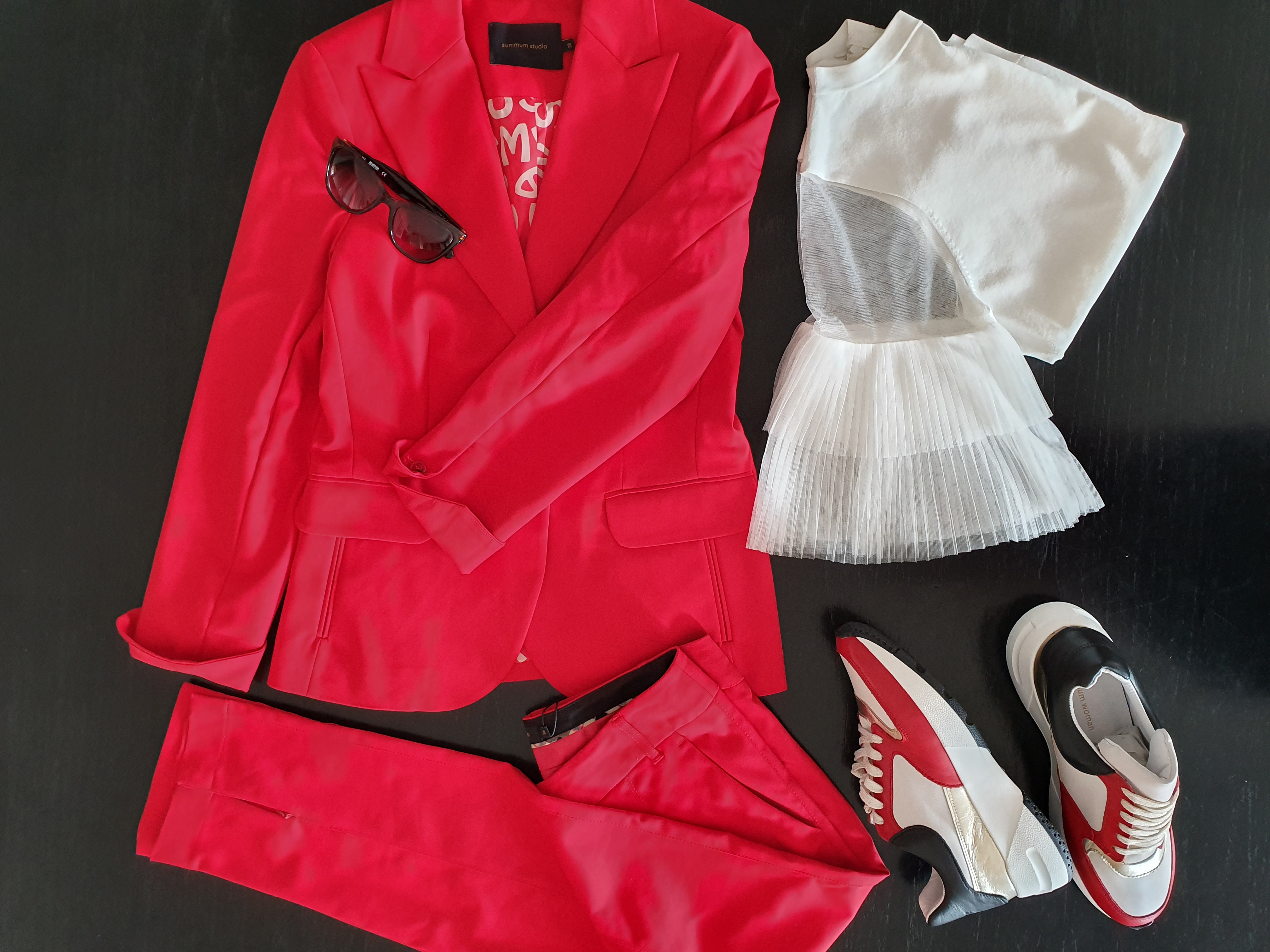 red suit flatlay